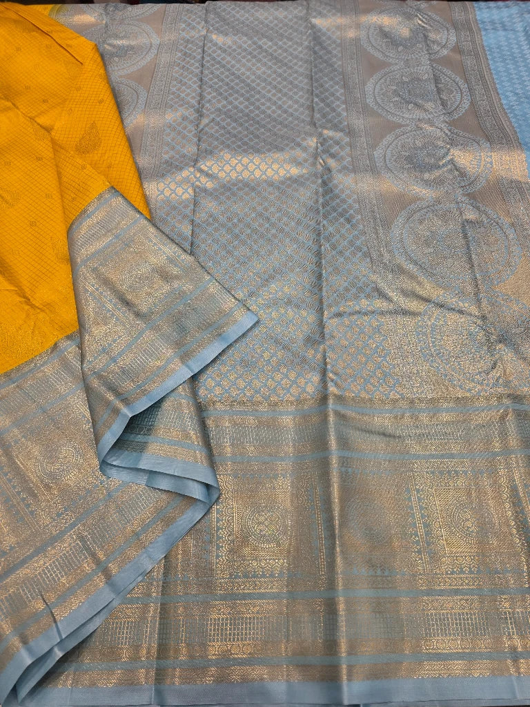 Mustard Yellow Semi Kanchipuram Silk Saree with Sky Blue Zari Border & Rich Brocade Pallu