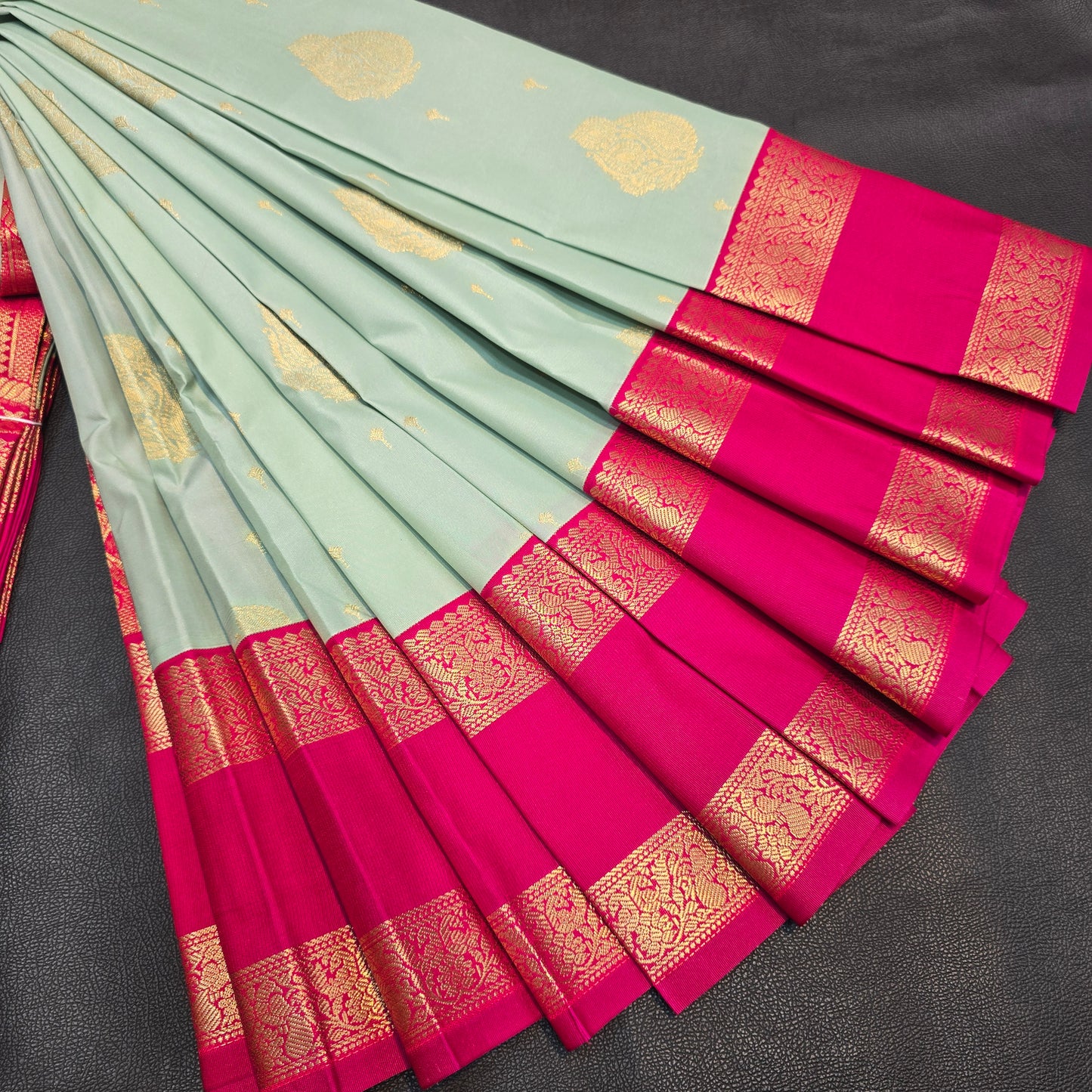 Pastel Mint Green Kanchipuram Semi Silk Saree with Rich Rani Pink Zari Border