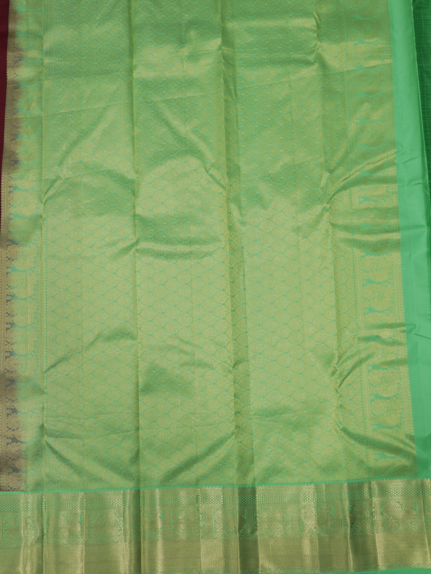 Wine Maroon Kanchipuram Semi Soft Silk Saree with Mint Green Korvai Border & Zari Buttas