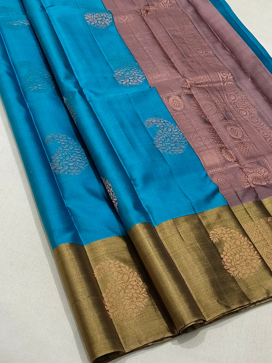 Contemporary Blue saree With Bronze Border And Copper Pallu