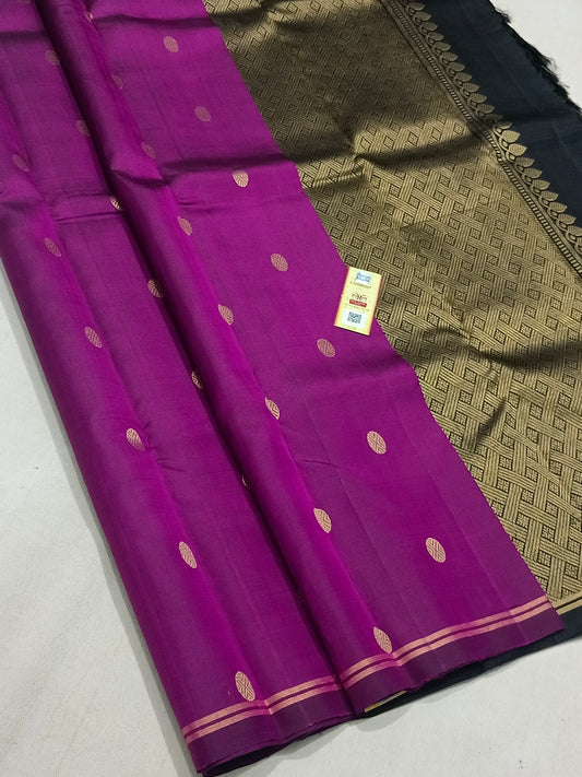 Traditional magenta kanchipuram silk saree with black border