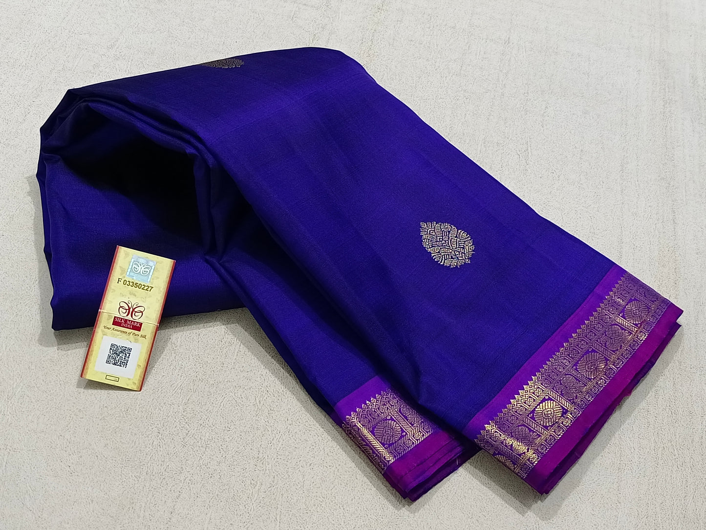 Traditional blue kanchipuram silk saree with purple border