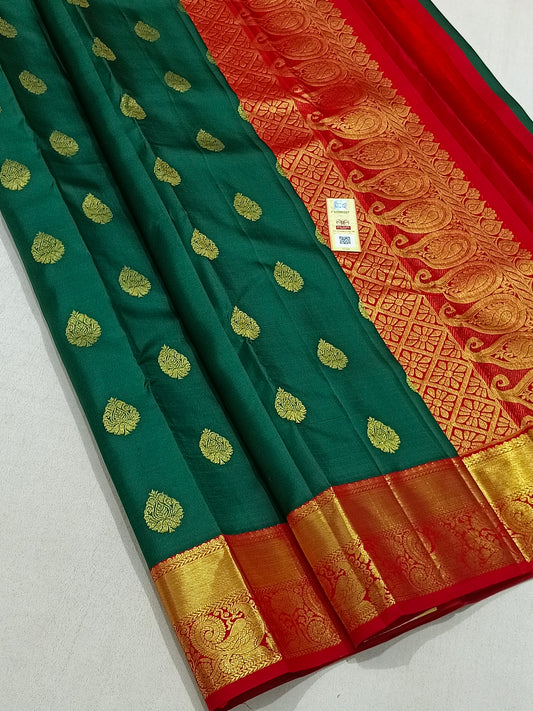 Traditional green kanchipuram silk saree with red border