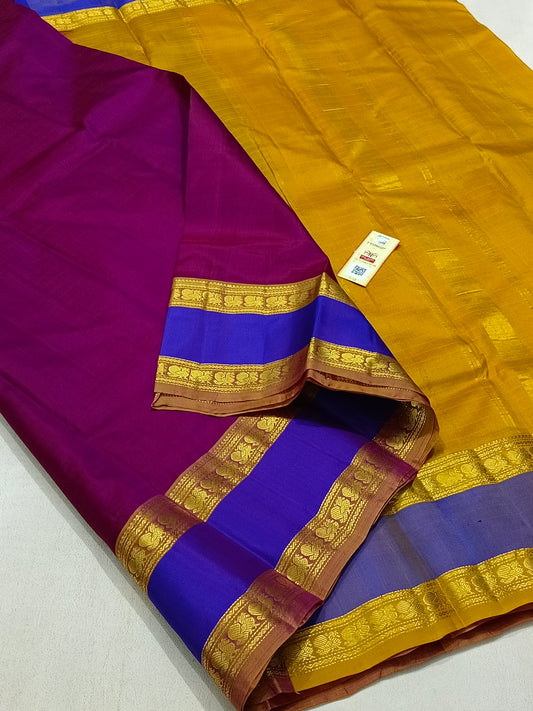 Traditional magenta kanchipuram silk saree with blue border