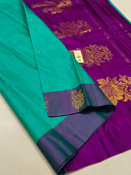 Traditional teal kanchipuram silk saree with violet border