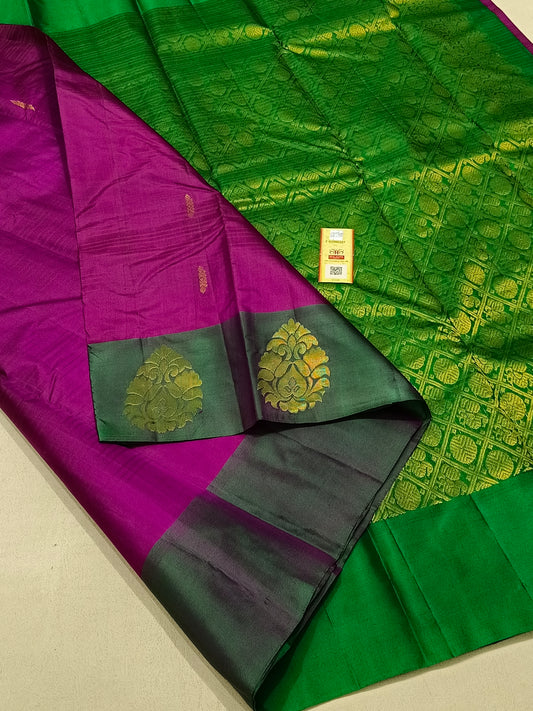 Traditional magenta kanchipuram silk saree with green pallu