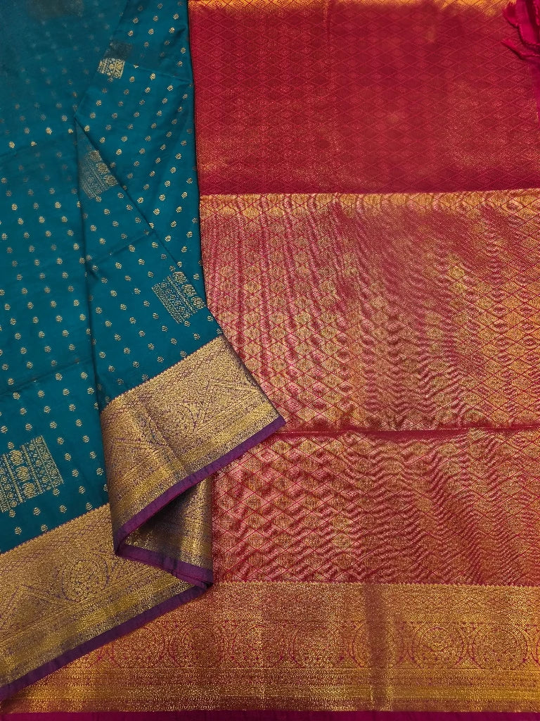Peacock Blue Semi Kanchipuram Silk Saree with Rani Pink Gold Zari Pallu & Traditional Border