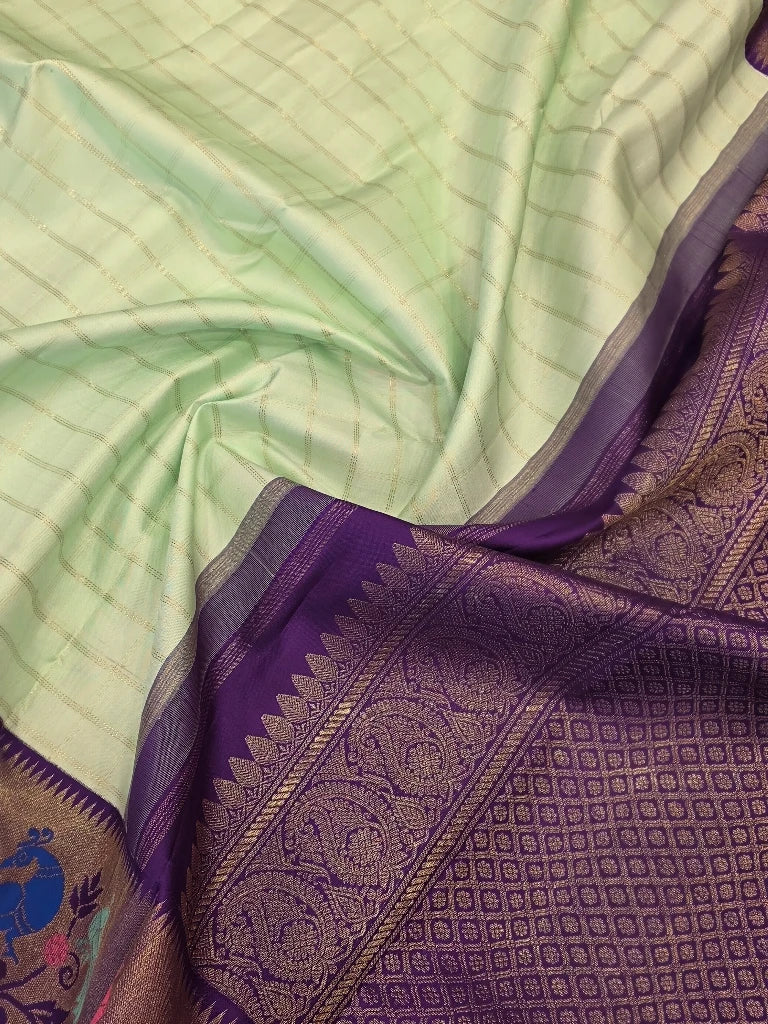 Pista Green Pure Kanchipuram Silk Saree with Purple Meenakari Peacock Border & Rich Gold Zari Pallu