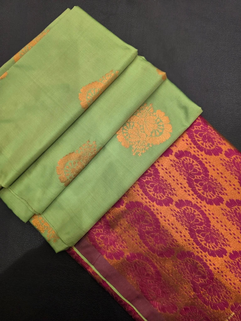 Pastel Green Semi Kanchipuram Silk Saree with Gold Zari Floral Buttas & Magenta Brocade Pallu