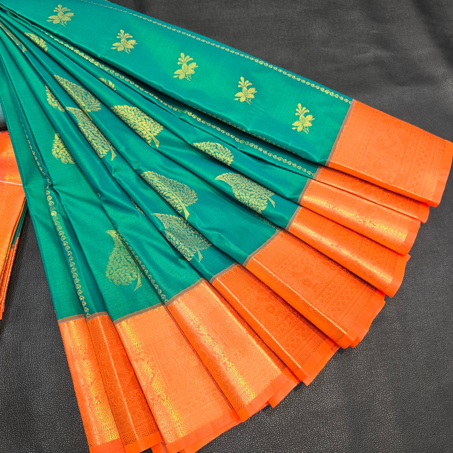 Emerald Green Kanchipuram Semi Silk Saree with Grand Orange Gold Zari Border