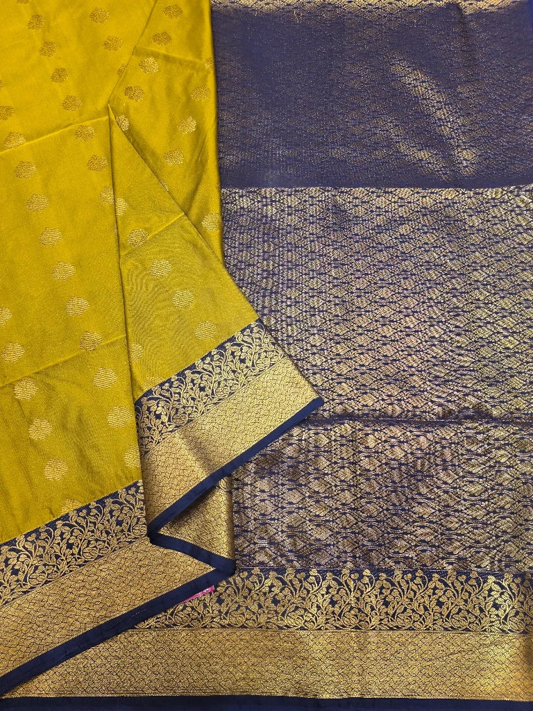 Mustard Yellow Semi Kanchipuram Silk Saree with Navy Blue Gold Zari Border & Rich Pallu