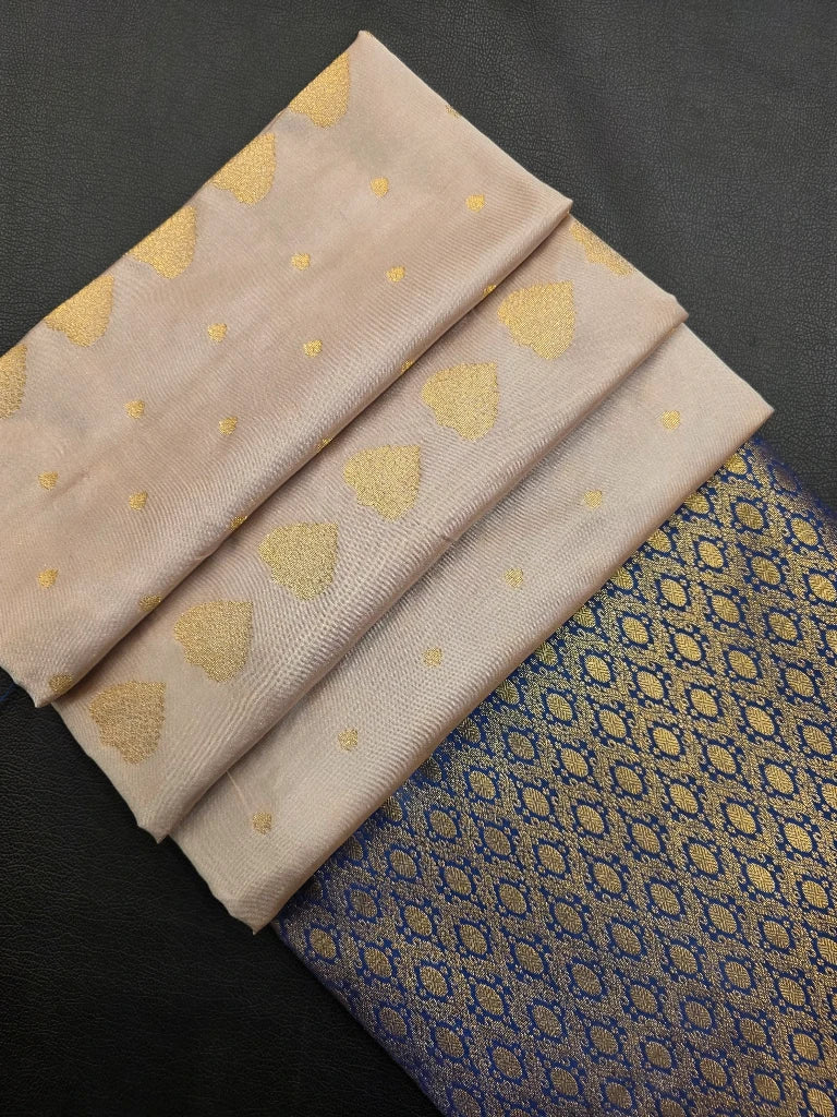 Ivory Cream Semi Kanchipuram Silk Saree with Gold Zari Buttas, Temple Border & Royal Blue Brocade Pallu