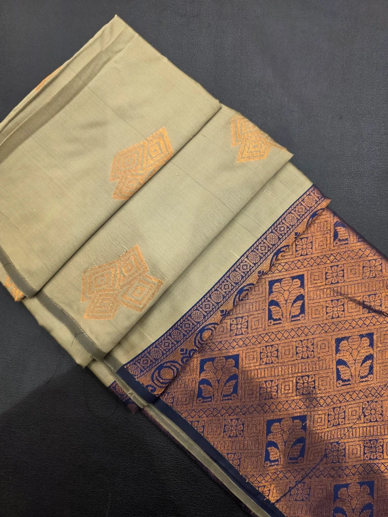 Pastel Sage Green Semi Kanchipuram Silk Saree with Gold Zari Buttas & Royal Blue Brocade Pallu