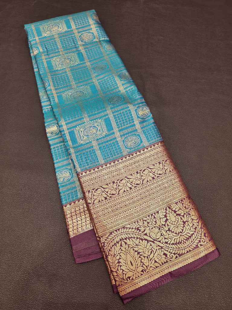 Turquoise Blue Semi Kanchipuram Silk Saree with Gold Zari Checks & Rich Purple Pallu