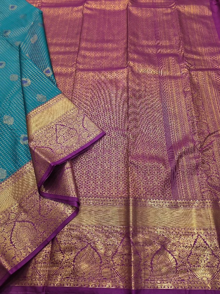 Peacock Blue Semi Kanchipuram Silk Saree with Royal Purple Gold Zari Border & Rich Floral Pallu