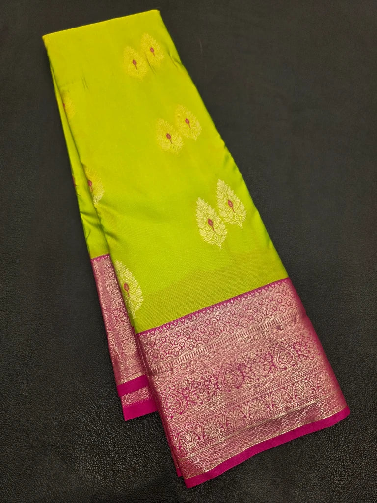 Parrot Green Semi Kanchipuram Silk Saree with Rani Pink Contrast Border & Rich Zari Pallu