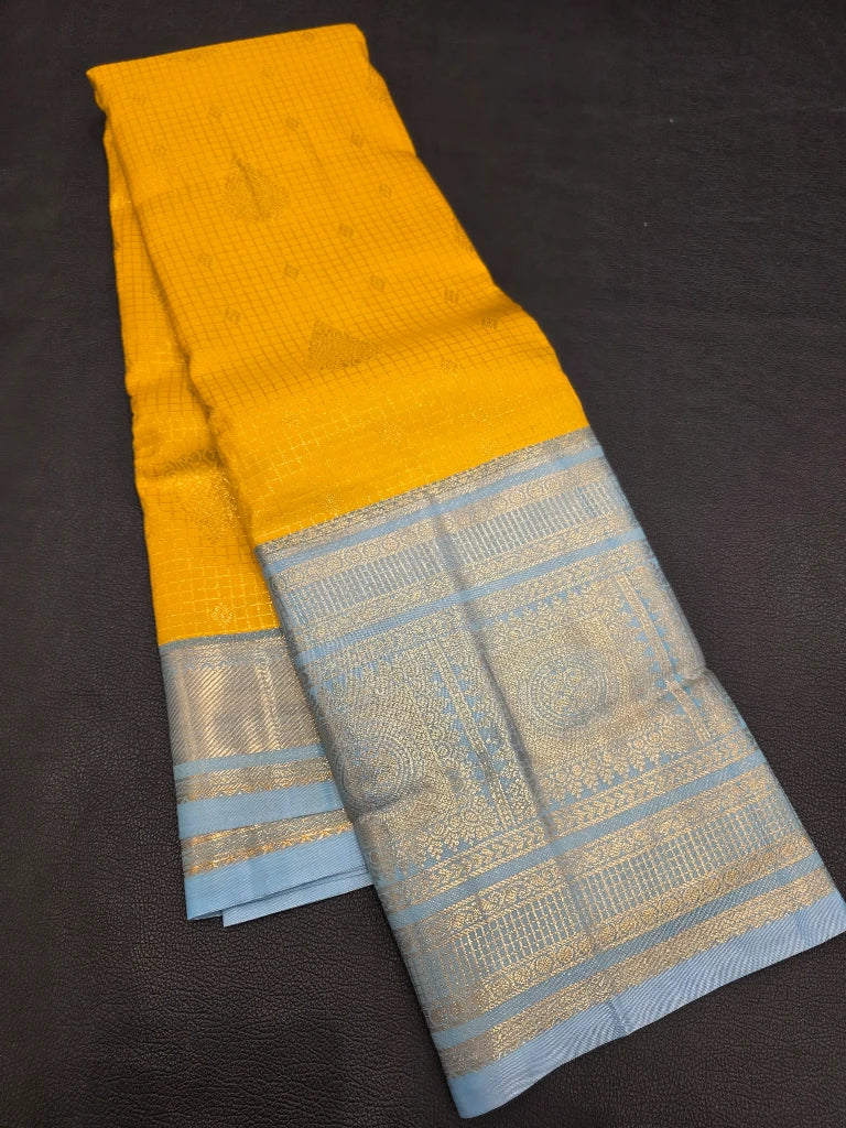 Mustard Yellow Semi Kanchipuram Silk Saree with Sky Blue Zari Border & Rich Brocade Pallu