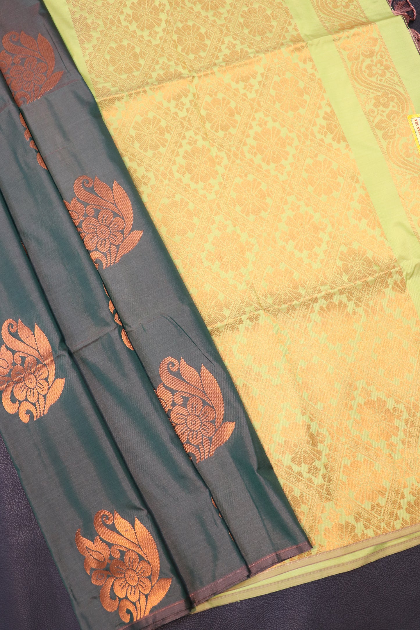 Royal Bottle Green & Pastel Yellow Semi Soft Silk Saree with Floral Zari Weaving Collection