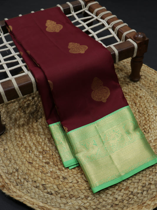 Wine Maroon Kanchipuram Semi Soft Silk Saree with Mint Green Korvai Border & Zari Buttas