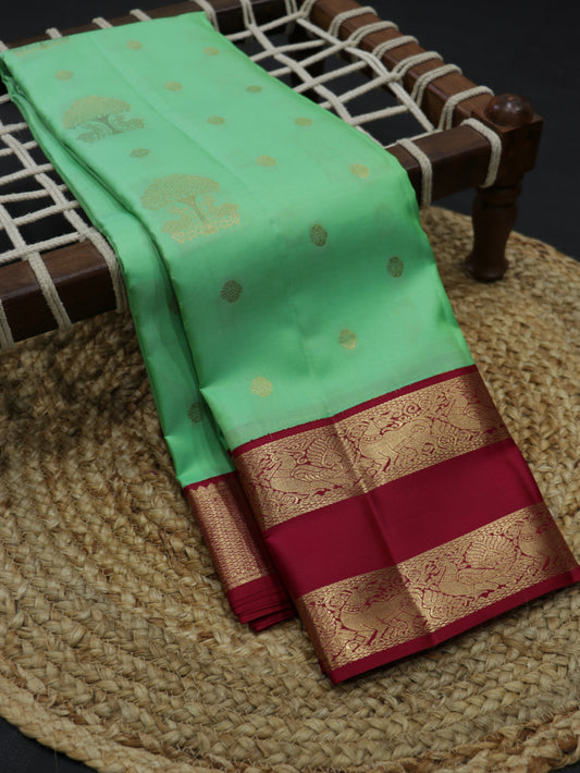 Mint Green Kanchipuram Semi Soft Silk Saree with Rani Pink Korvai Border & Rich Zari Pallu