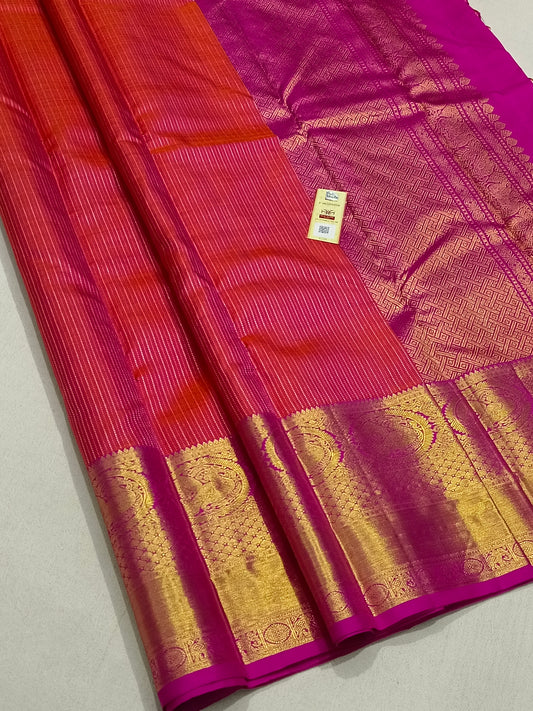 Traditional Orange kanchipuram silk bridal saree with pink border