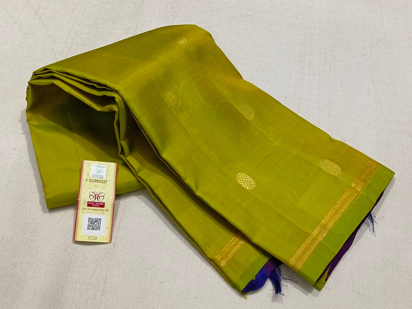 Traditional green kanchipuram silk saree with simple border