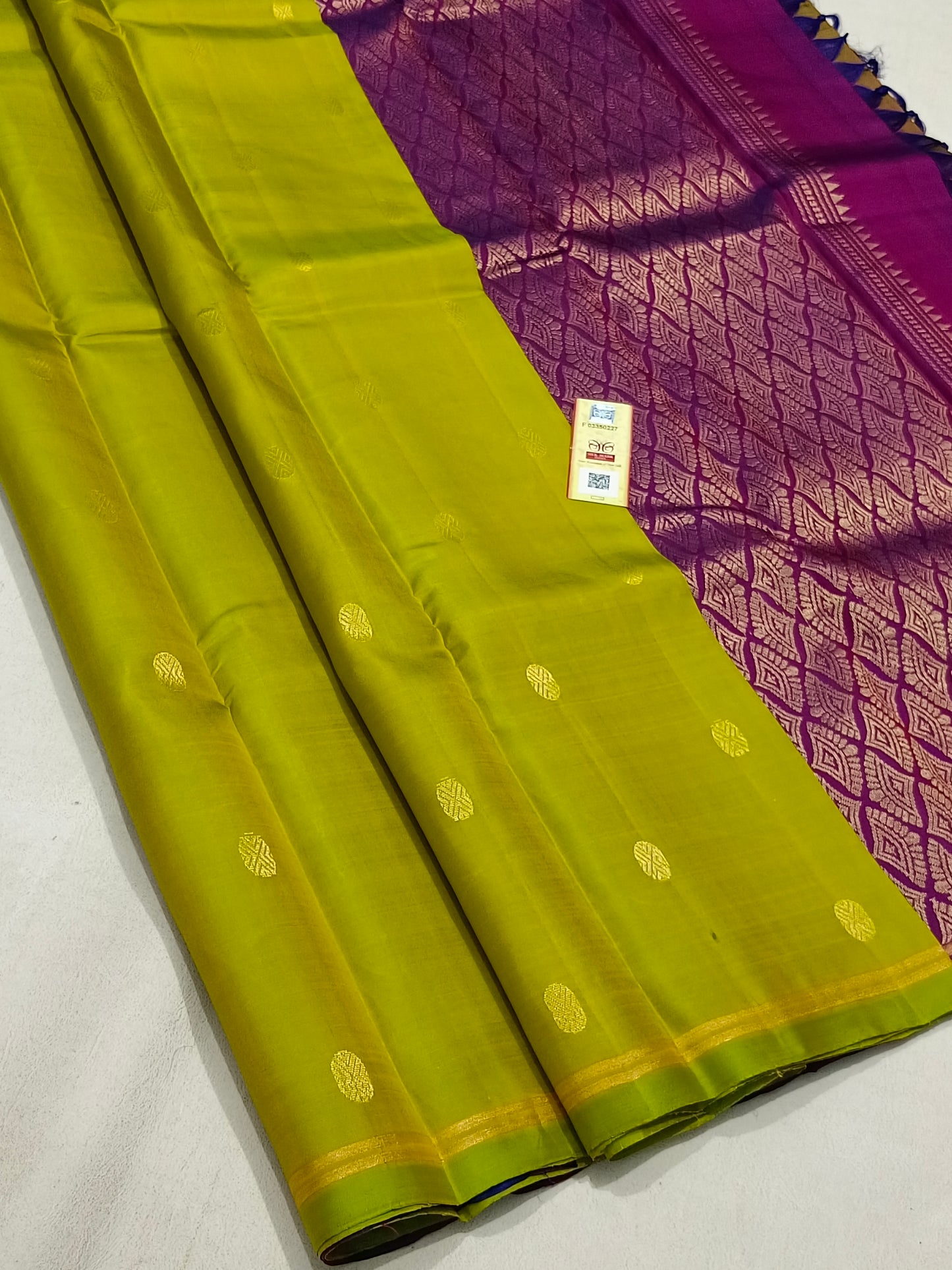 Traditional green kanchipuram silk saree with simple border