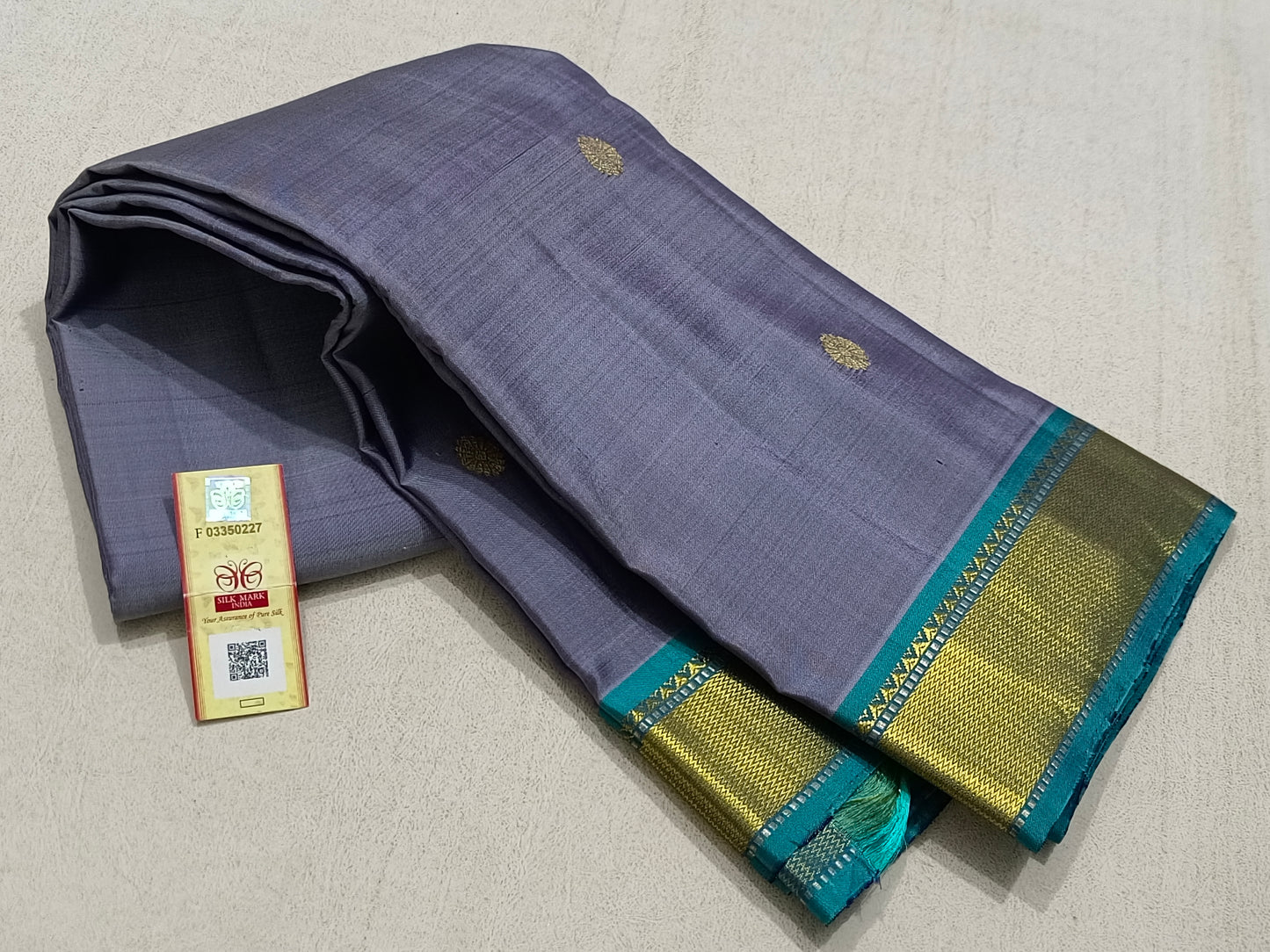 Traditional grey kanchipuram silk saree with sky blue border