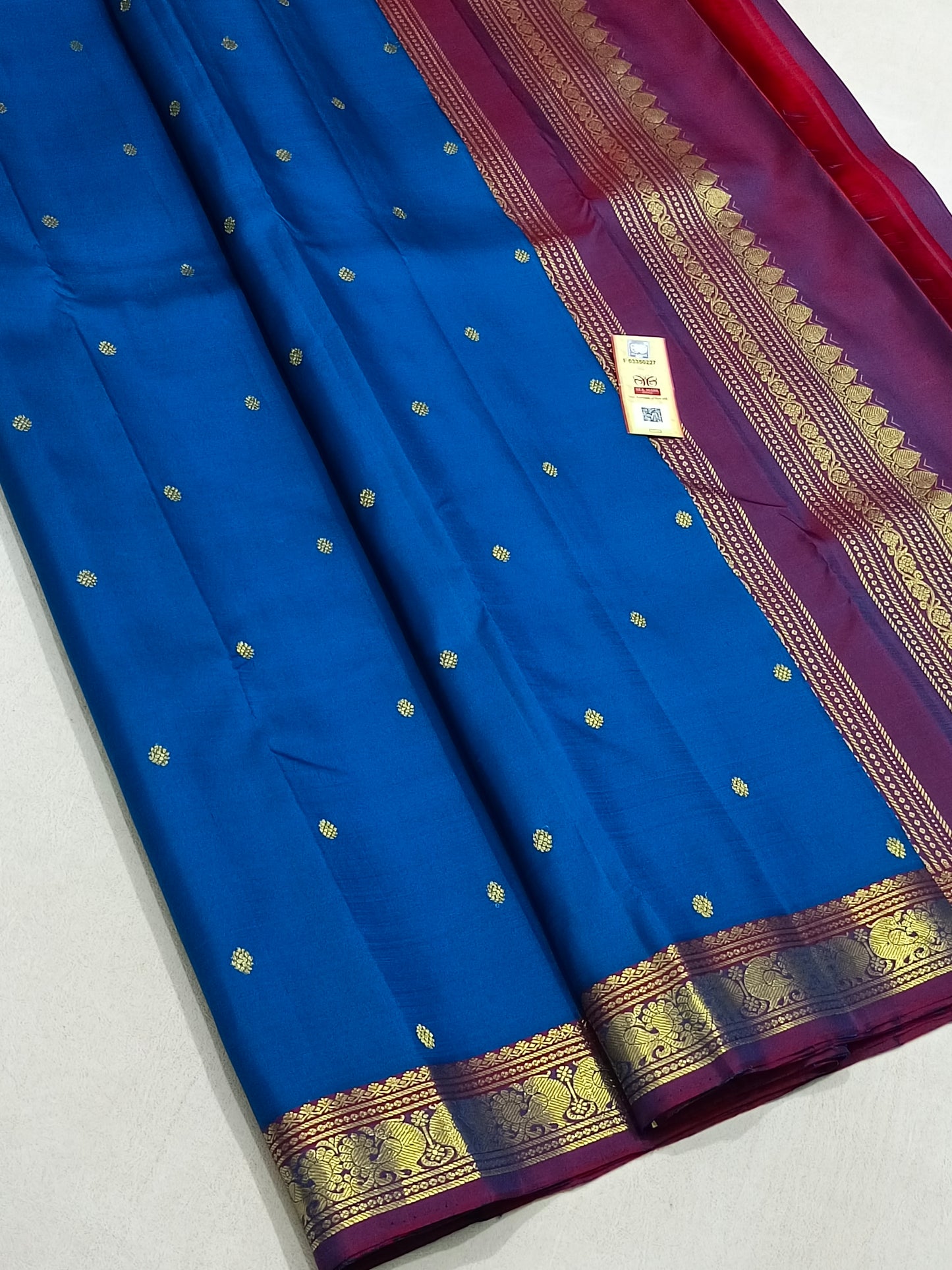 Traditional blue kanchipuram silk saree with purple border