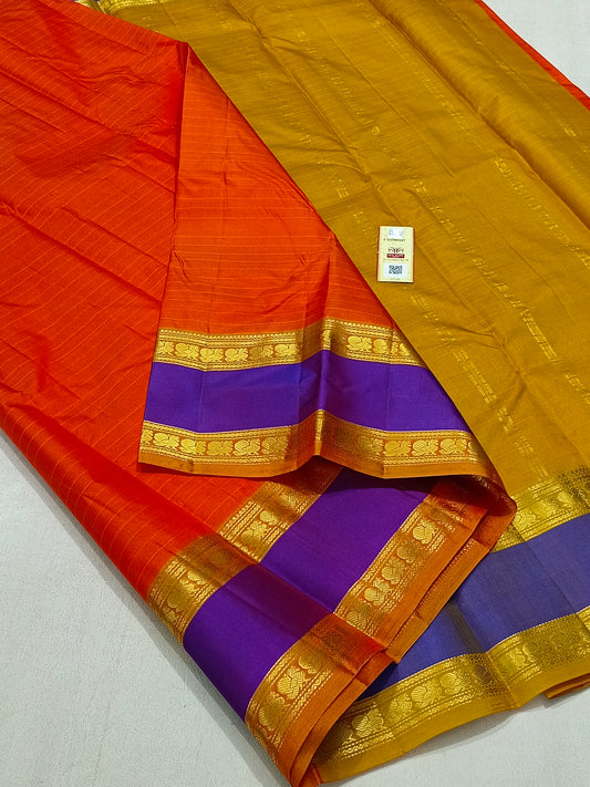 Traditional orange kanchipuram silk saree with violet border