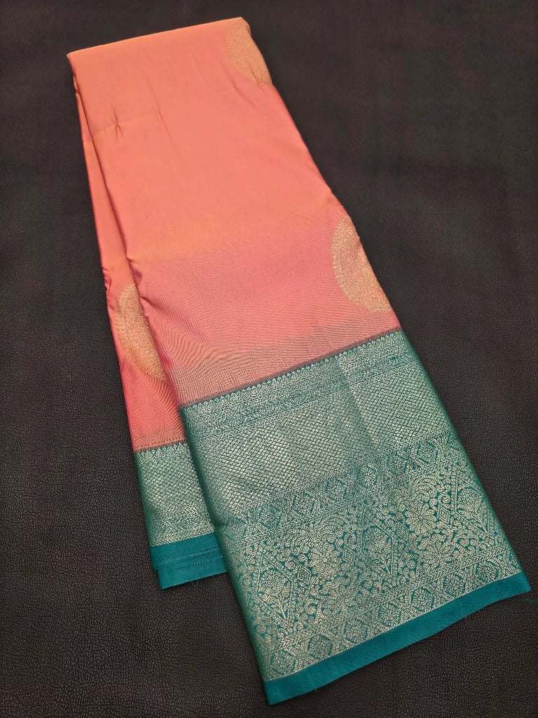Peach Pink Semi Kanchipuram Silk Saree with Gold Zari Buttas & Rich Emerald Green Pallu