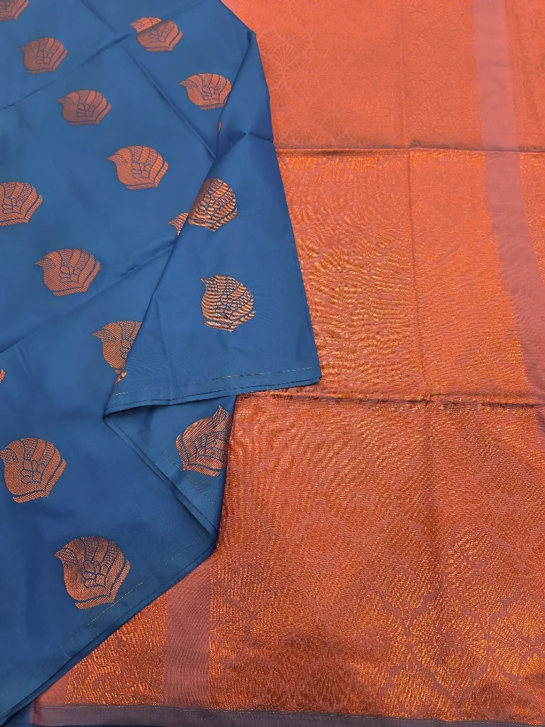 Royal Blue Semi Kanchipuram Silk Saree with Copper Zari Buttas & Rich Orange Brocade Pallu