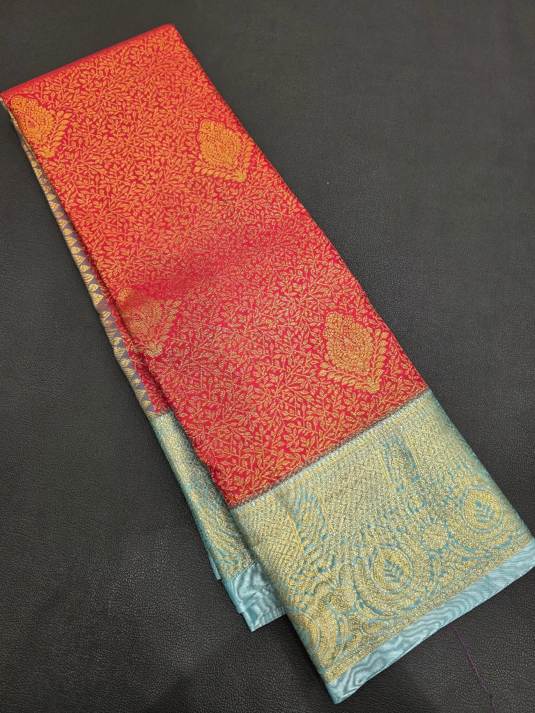 Red Semi Kanchipuram Silk Saree with Sky Blue Gold Zari Border & Rich Paisley Pallu
