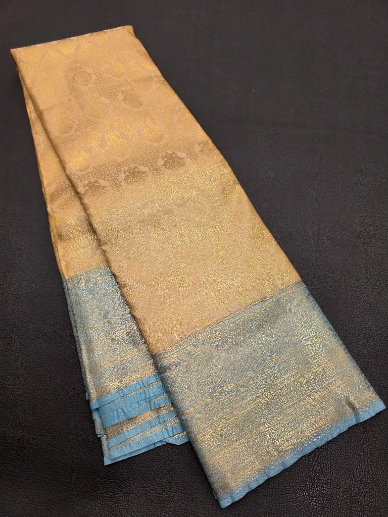Champagne Gold Semi Kanchipuram Silk Saree with Ice Blue Zari Border & Rich Floral Pallu